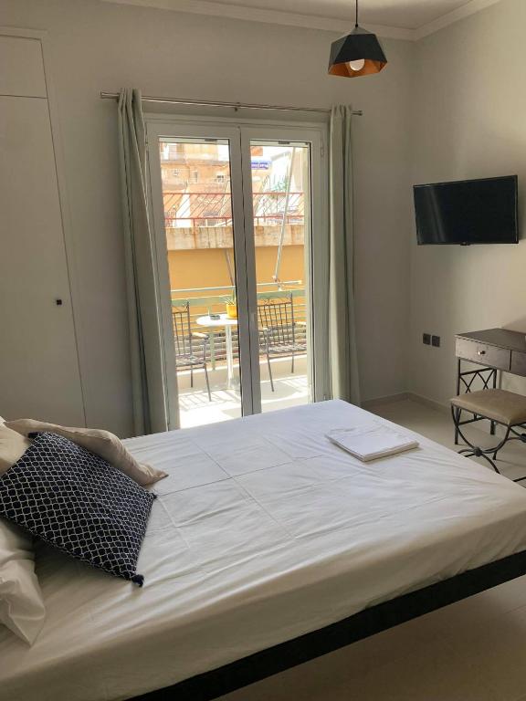 Postel nebo postele na pokoji v ubytování Meletis House