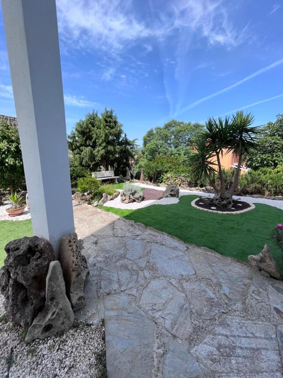 A garden outside Appartamenti Budoni