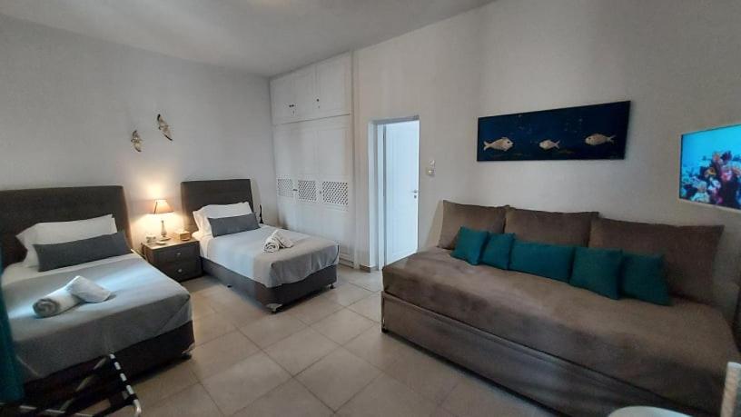 Postel nebo postele na pokoji v ubytování Folia Apartments