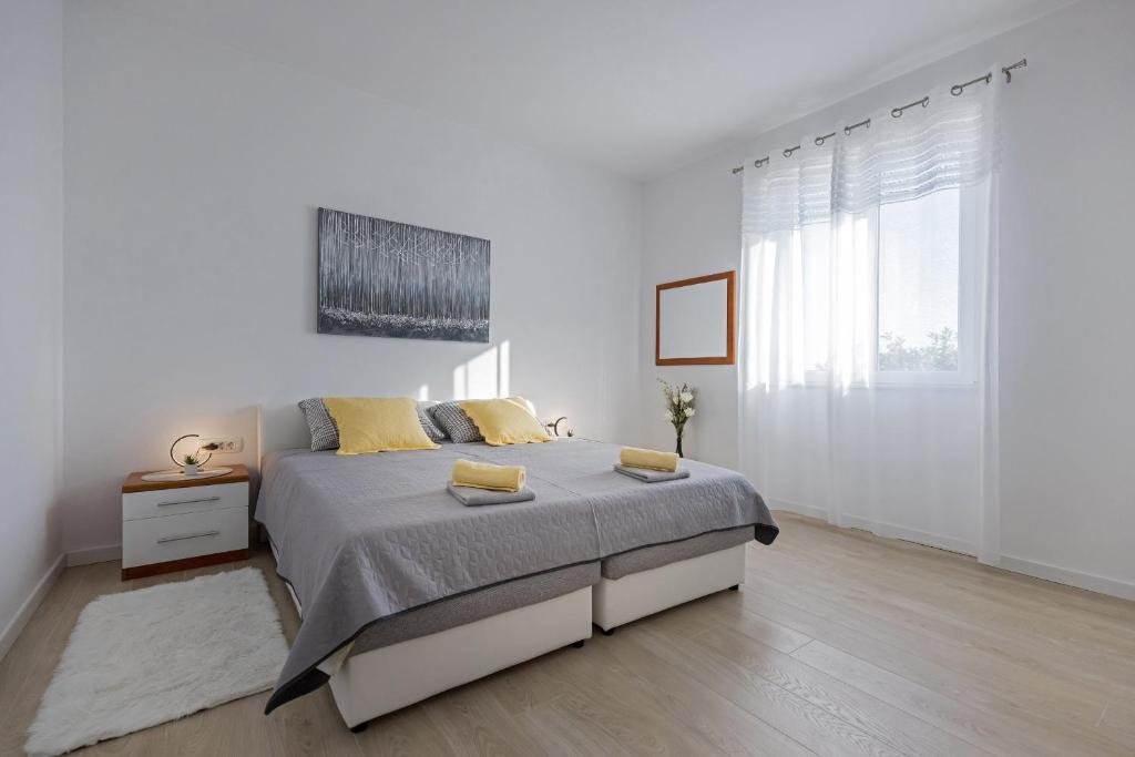 Posteľ alebo postele v izbe v ubytovaní Guest House Anna