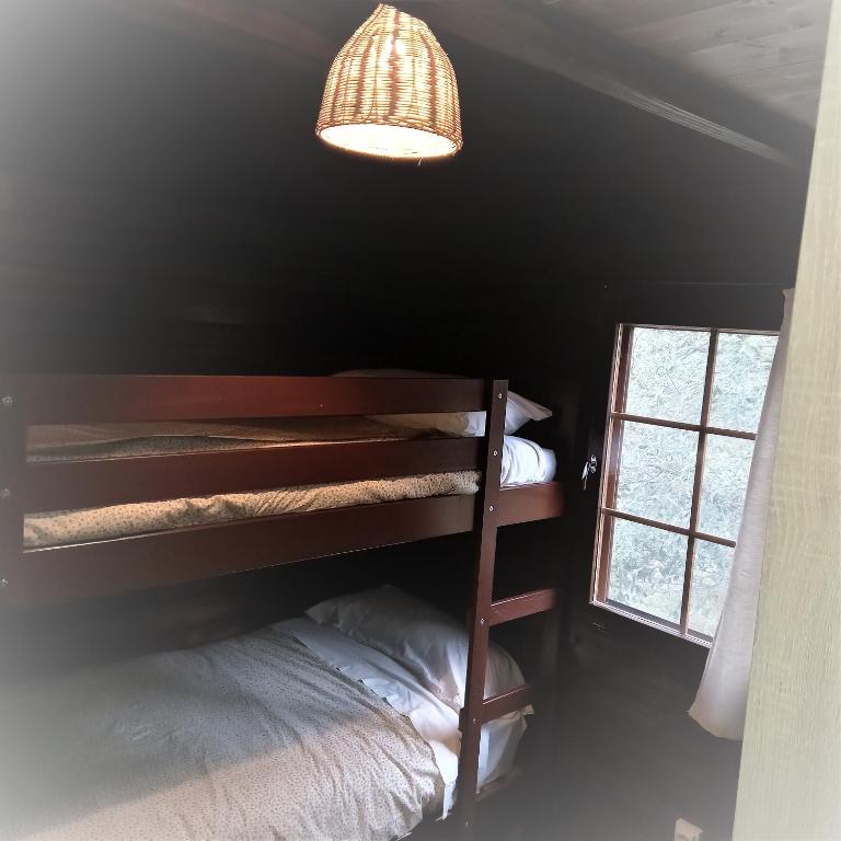 Posteľ alebo postele v izbe v ubytovaní Mas Olivella Cabaña Grande (Big Cabin)