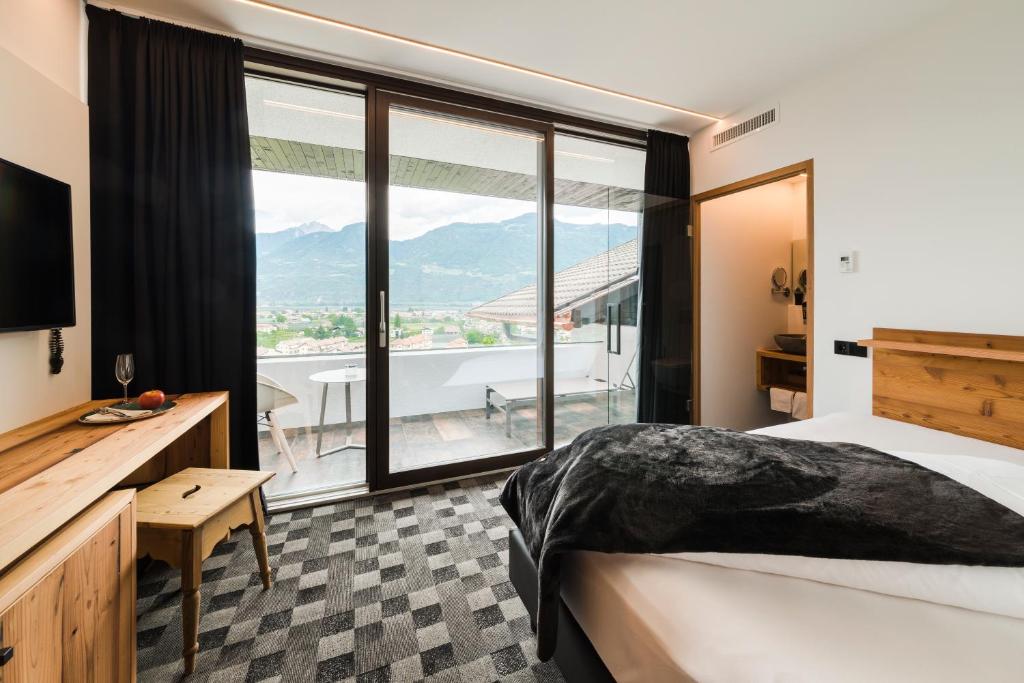 Postel nebo postele na pokoji v ubytování Garni Hotel Katzenthalerhof