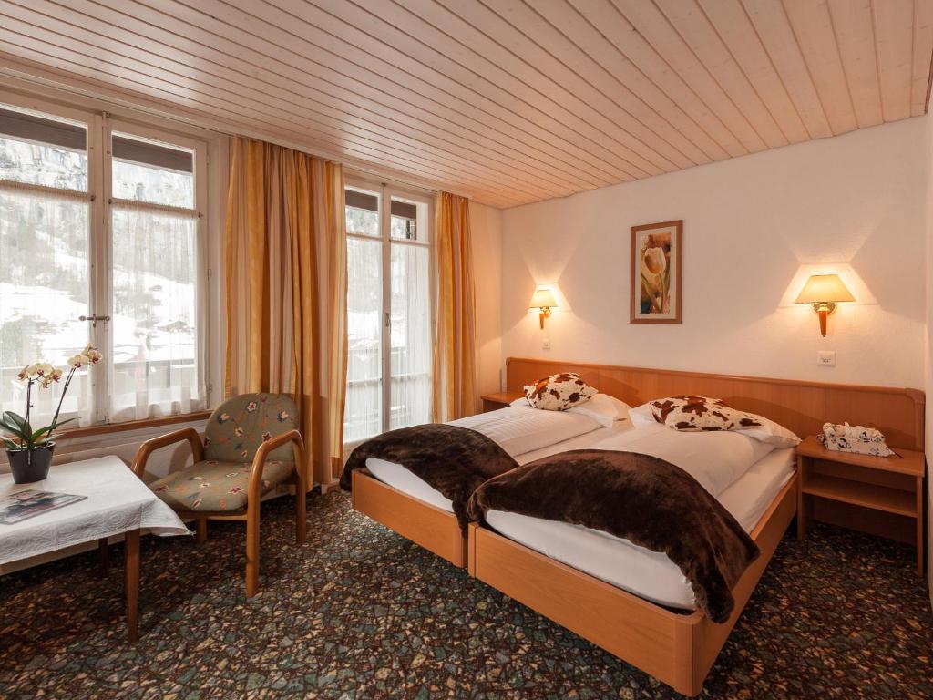 Posteľ alebo postele v izbe v ubytovaní Hotel Oberland