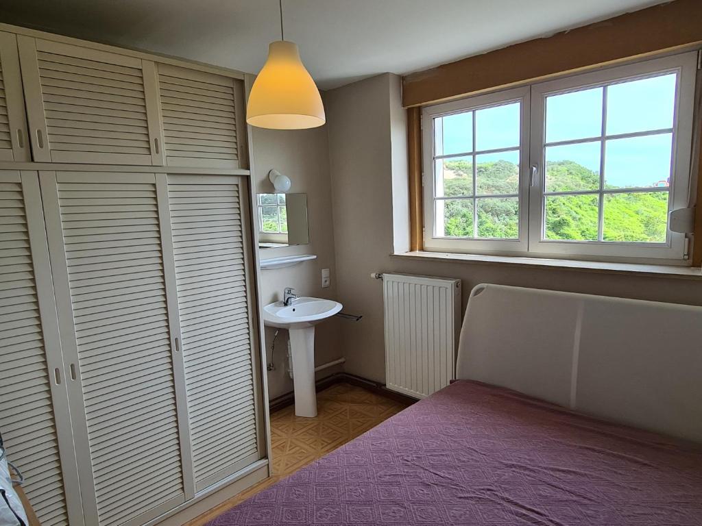 Postel nebo postele na pokoji v ubytování Villa Géry R-303