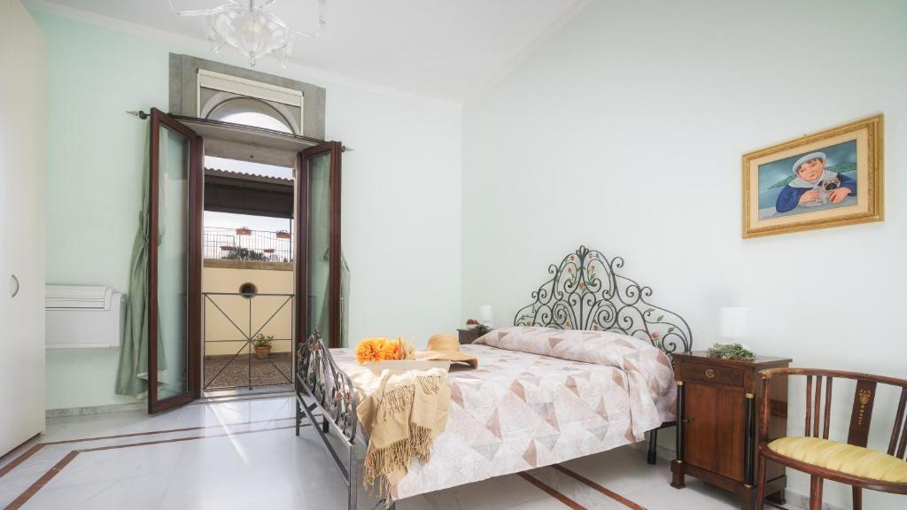 A bed or beds in a room at Villa Croci 26