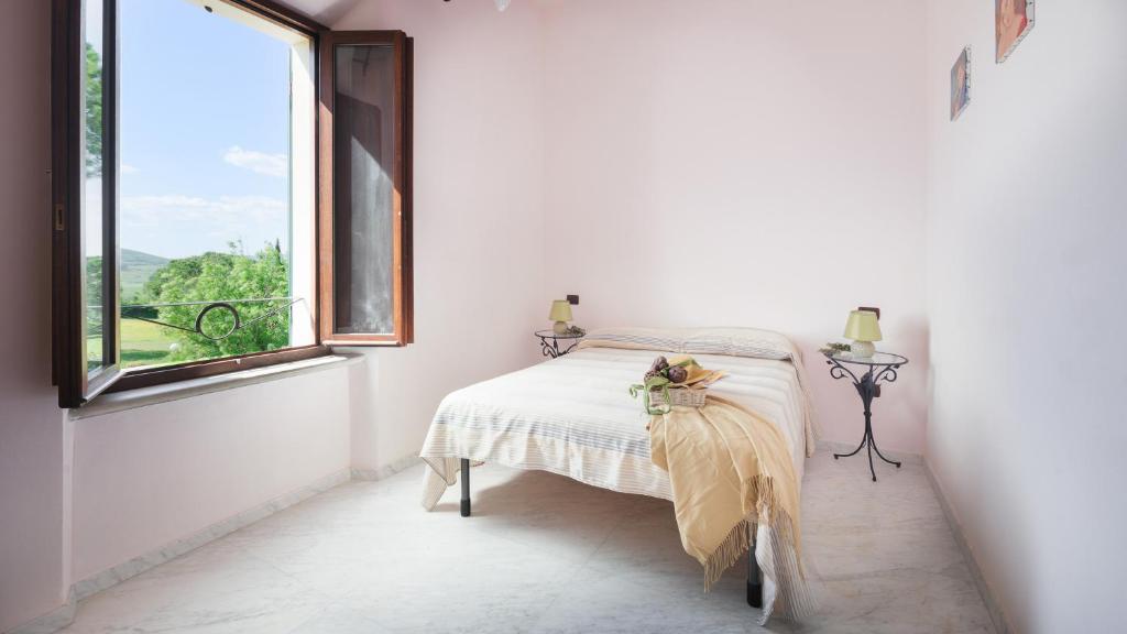 A bed or beds in a room at Villa Croci 26