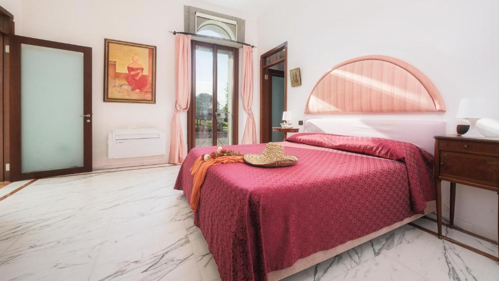 A bed or beds in a room at Villa Croci 26
