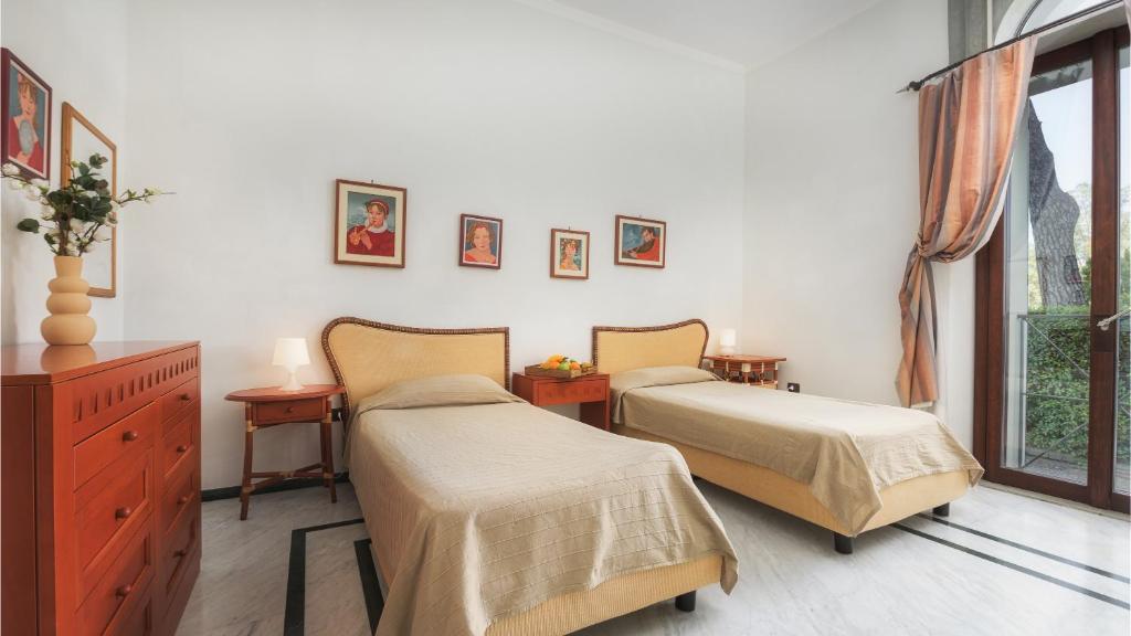 A bed or beds in a room at Villa Croci 26