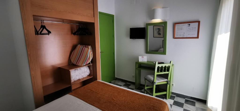 TV a/nebo společenská místnost v ubytování Hotel El Puntazo I