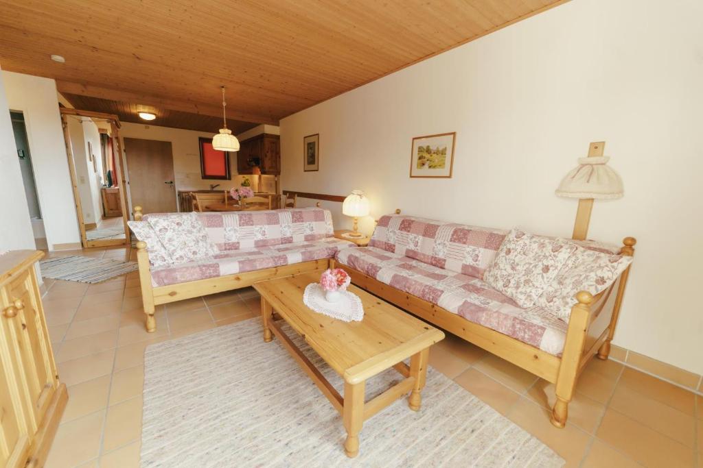 Posezení v ubytování Apartment Zirbengeist Gerlitzen