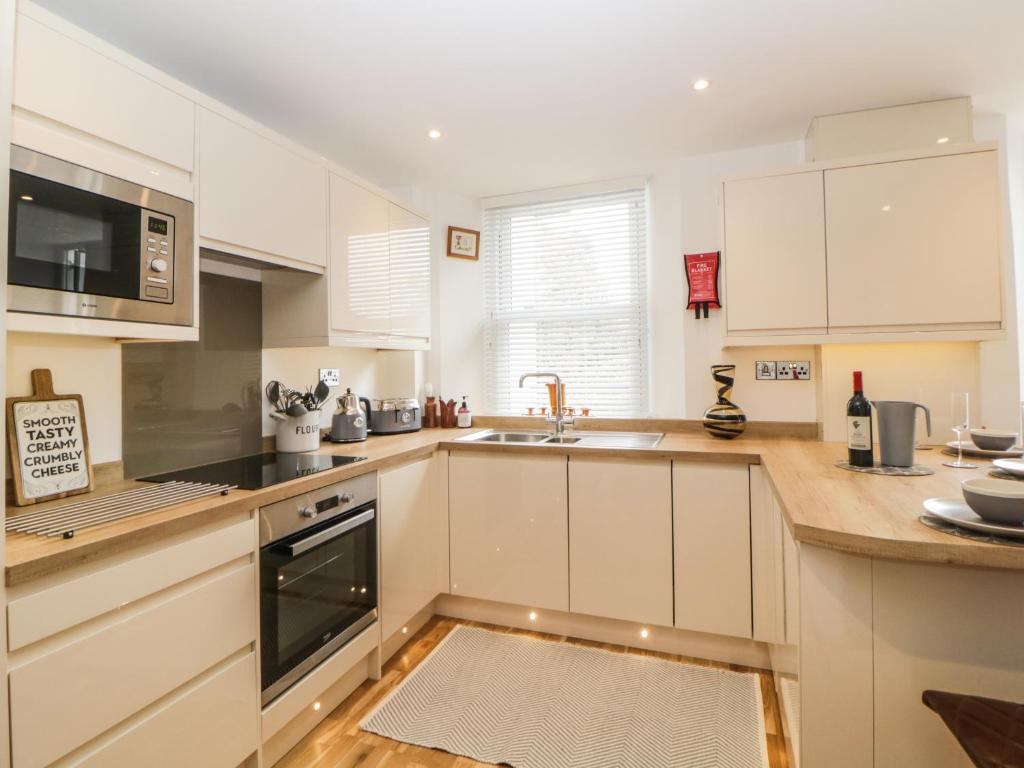 Kuchyň nebo kuchyňský kout v ubytování Apartment 4 10 Somers Court
