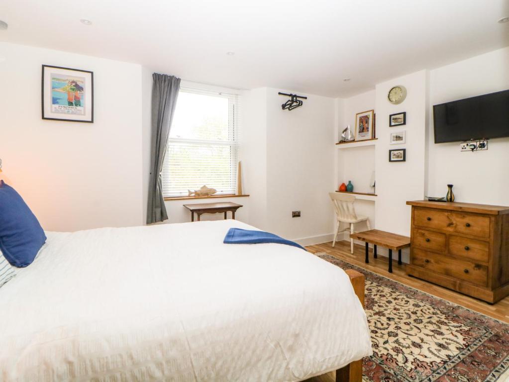 Postel nebo postele na pokoji v ubytování Apartment 4 10 Somers Court