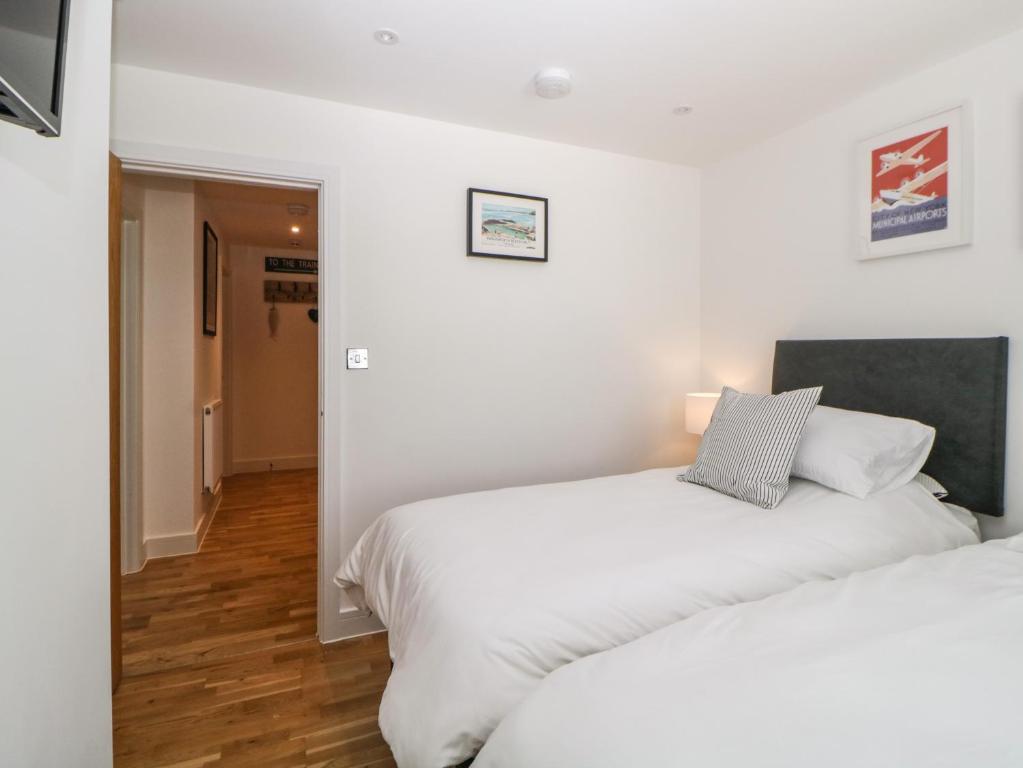 Postel nebo postele na pokoji v ubytování Apartment 4 10 Somers Court