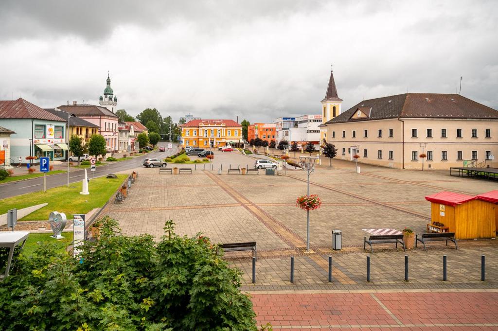a view of a town square in a city at Penzion Trstená in Trstená
