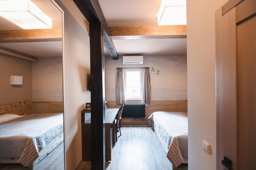Postel nebo postele na pokoji v ubytování Pieno Piano