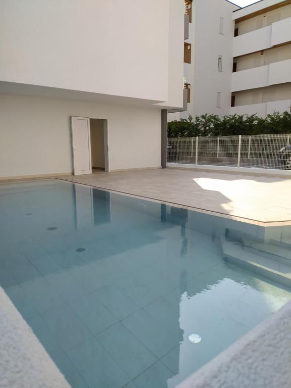Bazén v ubytování Jesolo Appartamenti F2 - Light Blue nebo v jeho okolí