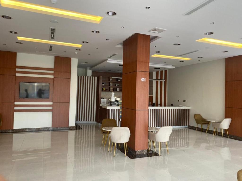 Posezení v ubytování هاوس إن House Inn