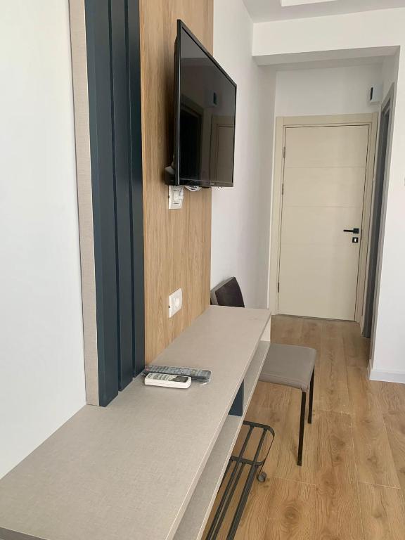 TV a/nebo společenská místnost v ubytování Hotel Unirea