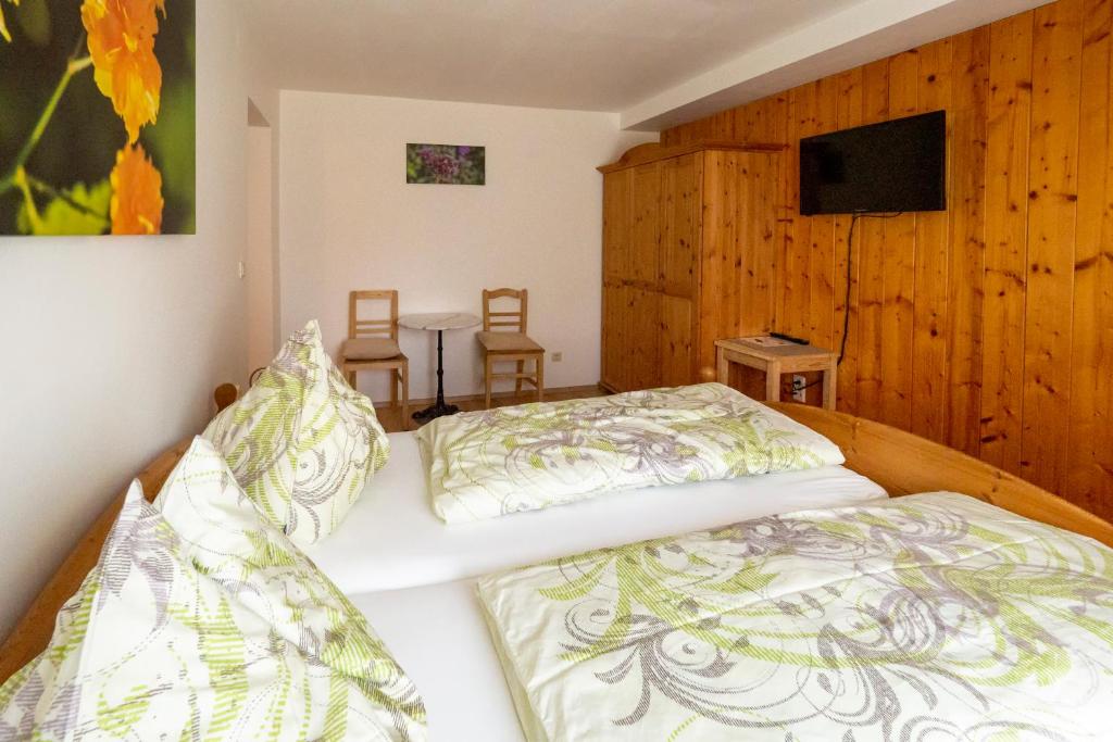 Postel nebo postele na pokoji v ubytování Gästezimmer Ilse Brauneis