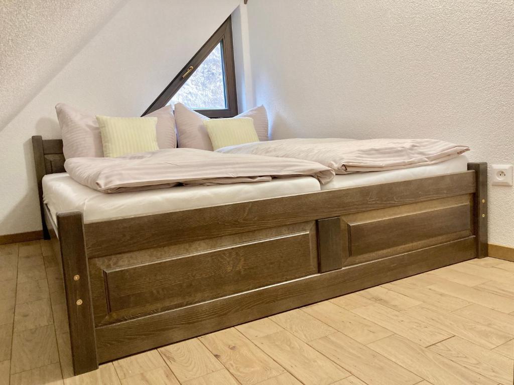 Postel nebo postele na pokoji v ubytování Stará Zvonica