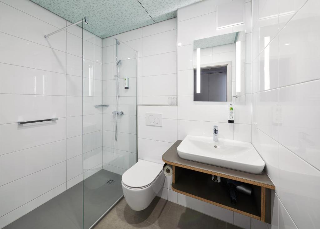 Koupelna v ubytování Stadthotel am Wasen