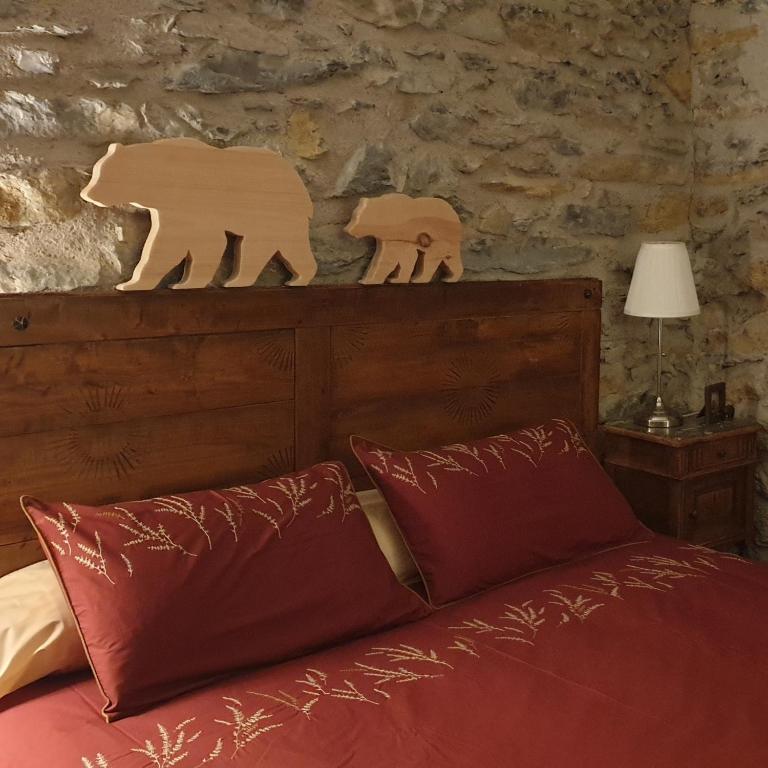 Postel nebo postele na pokoji v ubytování chambre et table d'hôtes La Grande Ourse
