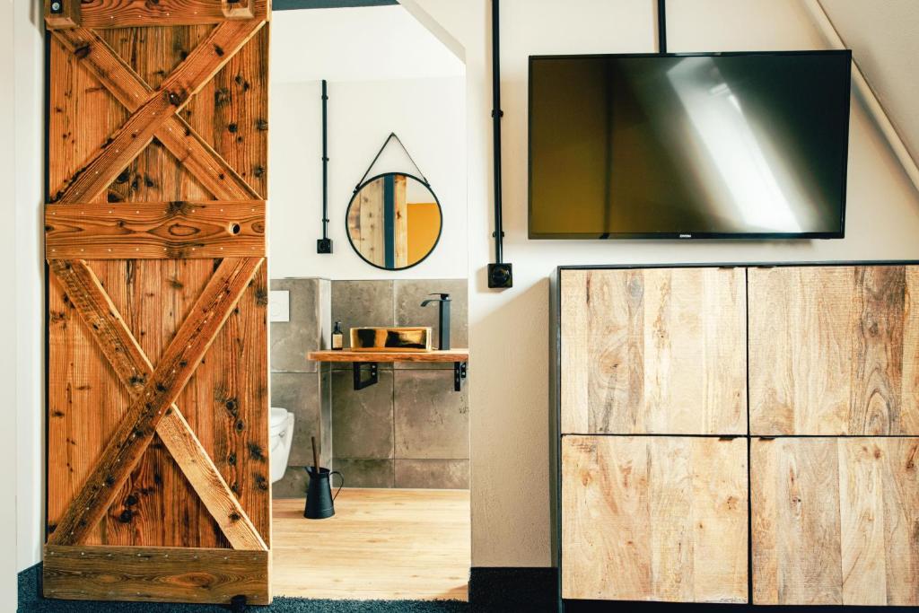 Kuchyň nebo kuchyňský kout v ubytování Agli Hotel