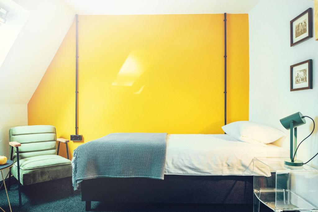 Postel nebo postele na pokoji v ubytování Agli Hotel
