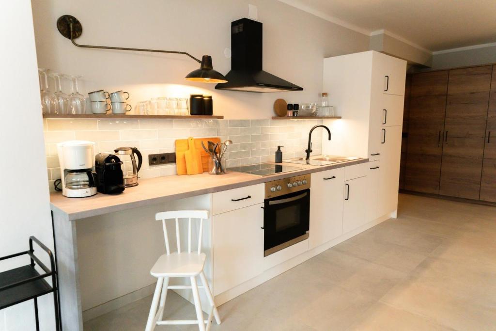 A kitchen or kitchenette at Familienapartment Reifnitz