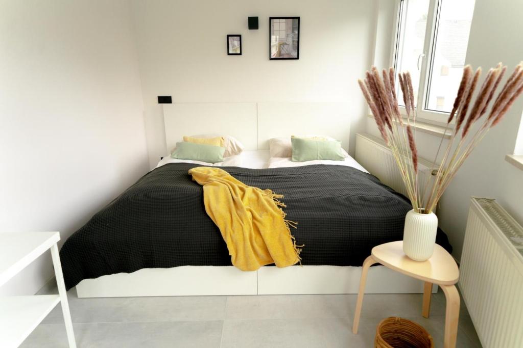 A bed or beds in a room at Familienapartment Reifnitz