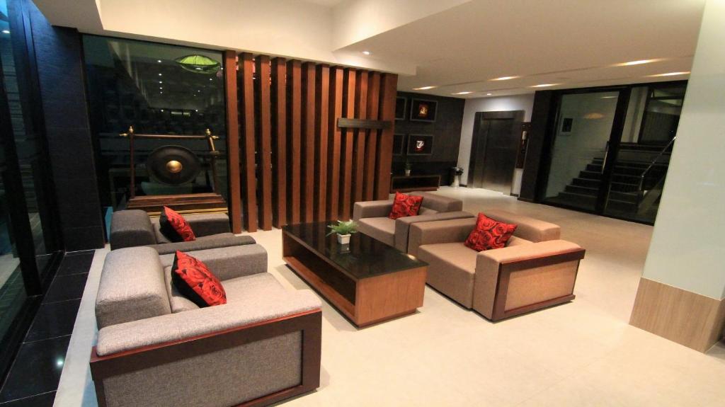 Posezení v ubytování Inn Residence Serviced Suites - SHA Extra Plus