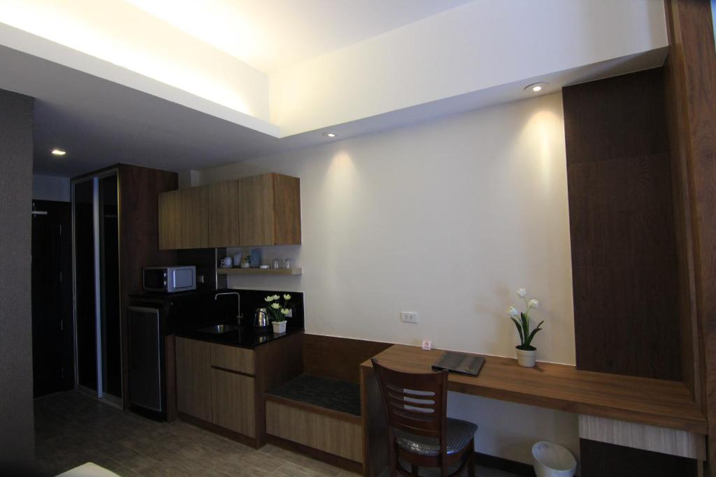 Kuchyň nebo kuchyňský kout v ubytování Inn Residence Serviced Suites - SHA Extra Plus