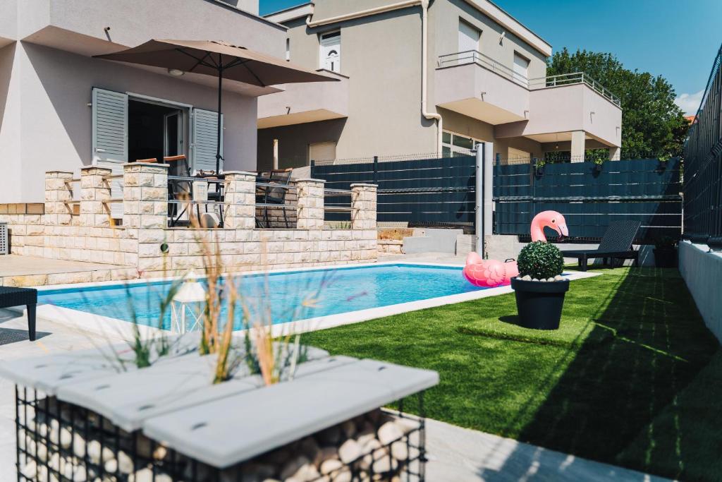 Bazén v ubytovaní Mar-ta Holiday Home alebo v jeho blízkosti