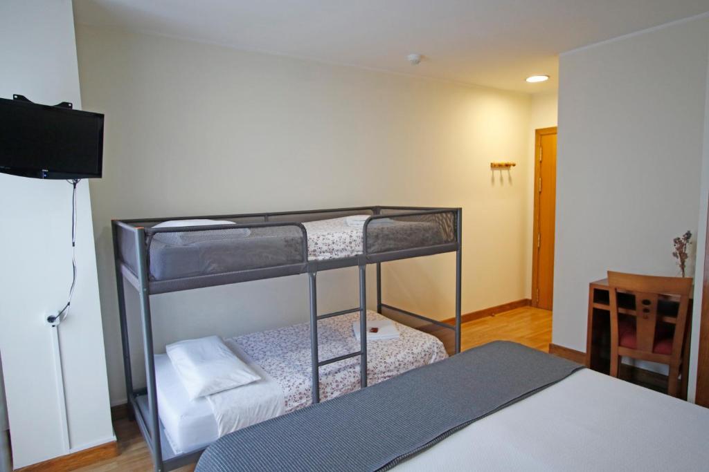 Postel nebo postele na pokoji v ubytování Villa de Colunga
