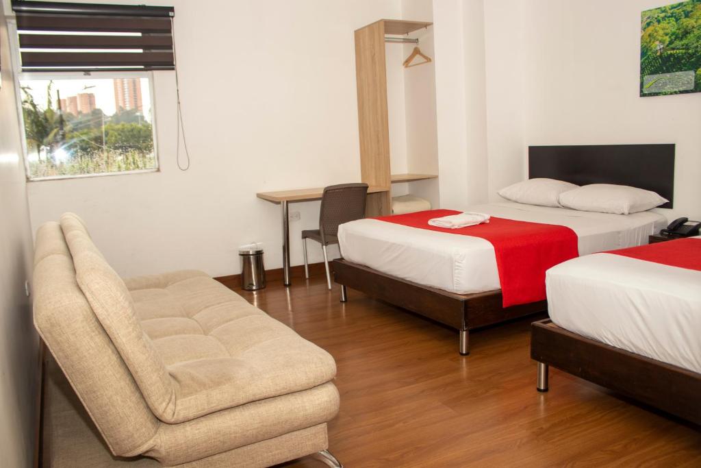 Postel nebo postele na pokoji v ubytování Hotel Valle de San Nicolas