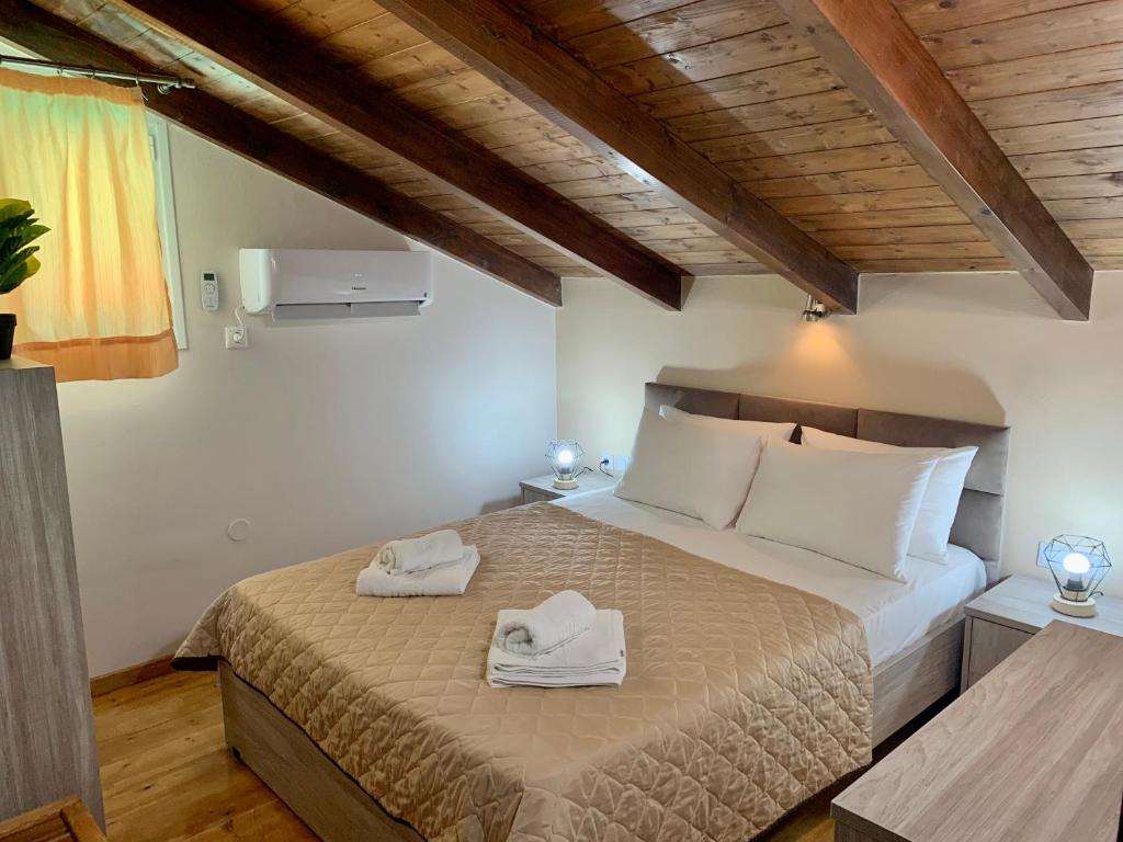 Postel nebo postele na pokoji v ubytování Dimarion Villas
