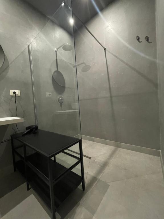 Koupelna v ubytování Minioto Rooms