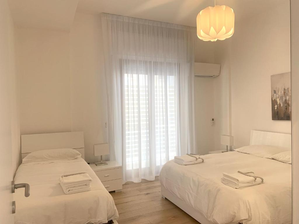 Posteľ alebo postele v izbe v ubytovaní Residence D'azeglio