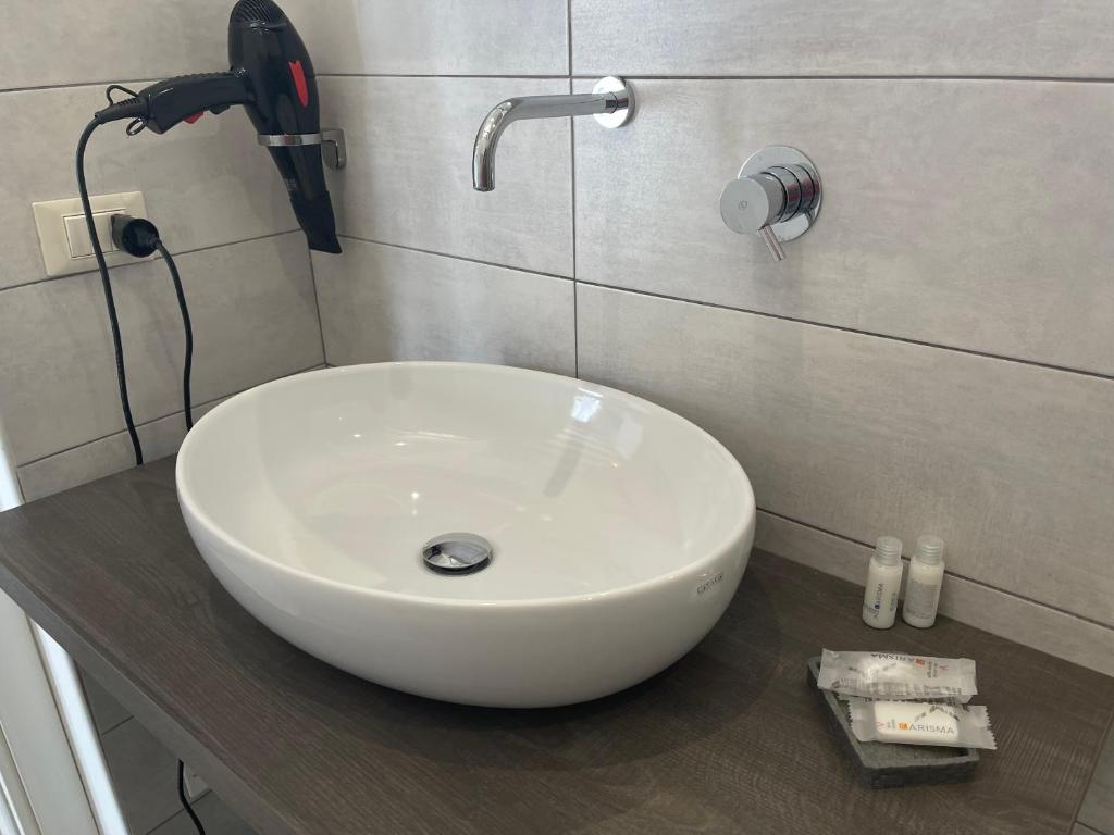 Koupelna v ubytování Minioto Rooms
