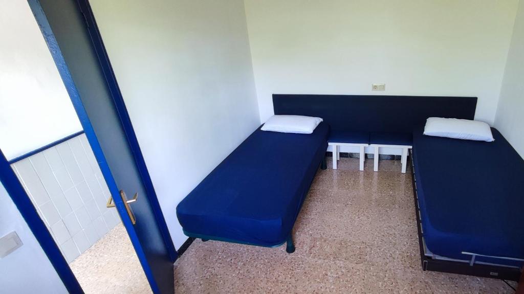 Posteľ alebo postele v izbe v ubytovaní Area 340 Camper Park