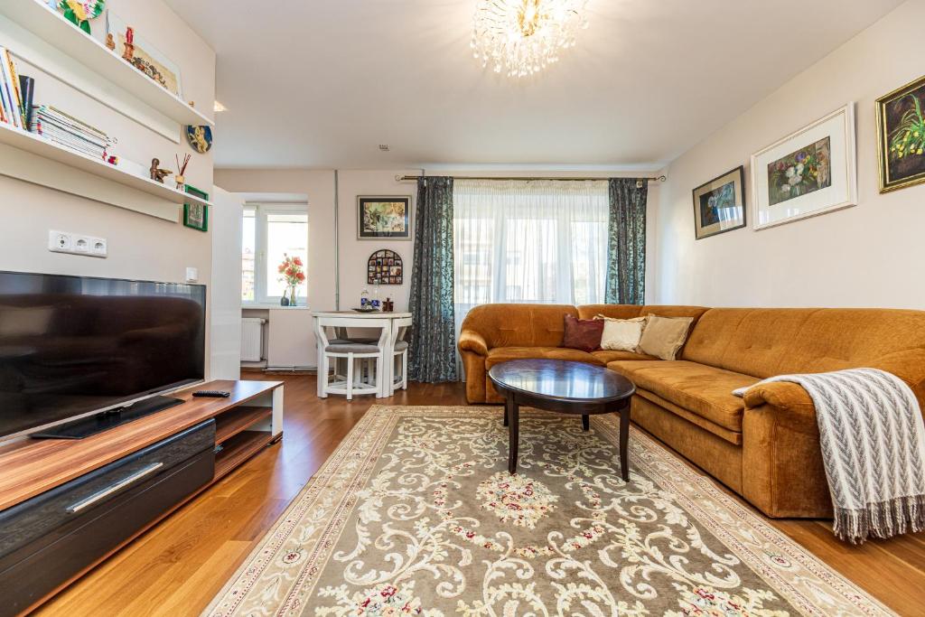 Μια τηλεόραση ή/και κέντρο ψυχαγωγίας στο Excellent apartment in Palanga