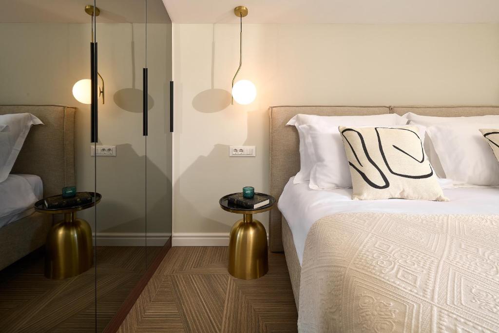 Postel nebo postele na pokoji v ubytování Luxury Apartments Villa Mala Split