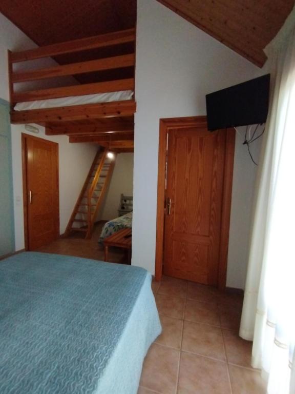 Postel nebo postele na pokoji v ubytování Hostal Restaurant Paca