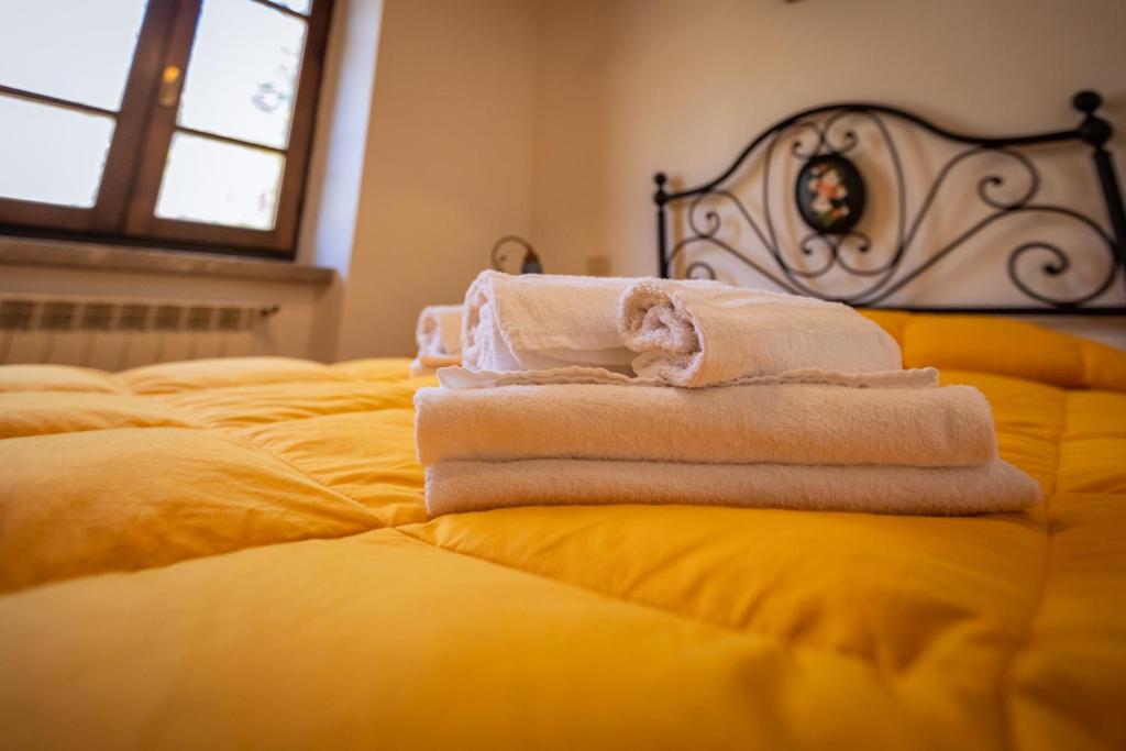 Posteľ alebo postele v izbe v ubytovaní Santa Fiora Ospitalità Diffusa - Villa Vittoria