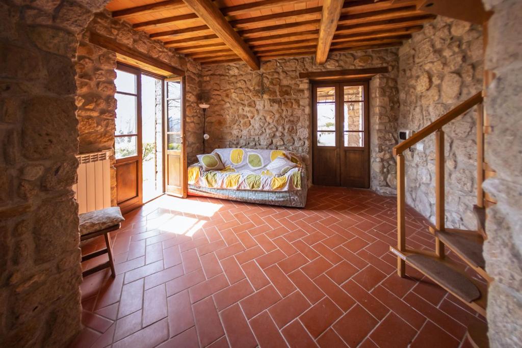 Posteľ alebo postele v izbe v ubytovaní Santa Fiora Ospitalità Diffusa - Villa Vittoria