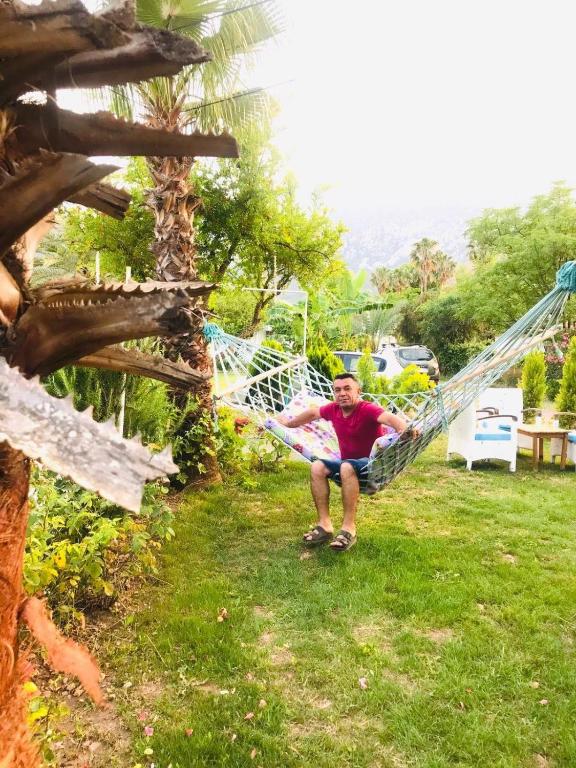 Ein Garten an der Unterkunft Adrasan Maviay Hotel