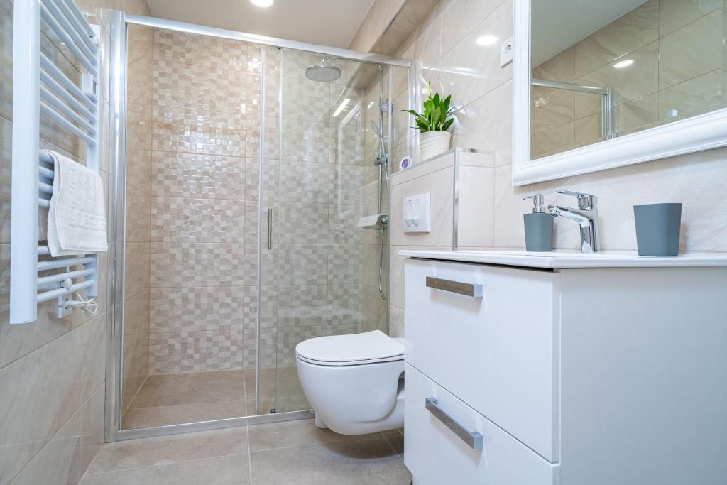 Kúpeľňa v ubytovaní Apartmani Kralj
