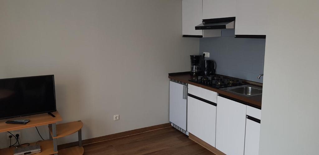 Kuchyň nebo kuchyňský kout v ubytování Pension Strohm im Lieth Café