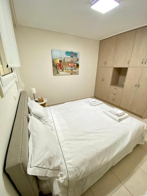 Posteľ alebo postele v izbe v ubytovaní PH Marina Apartments