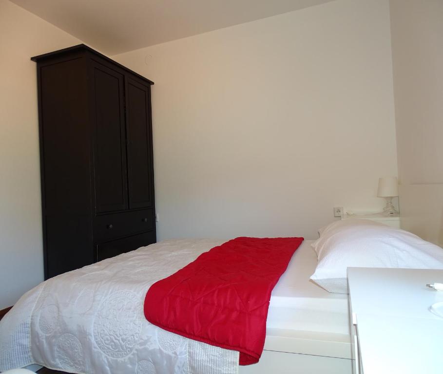 Postel nebo postele na pokoji v ubytování Apartmani David